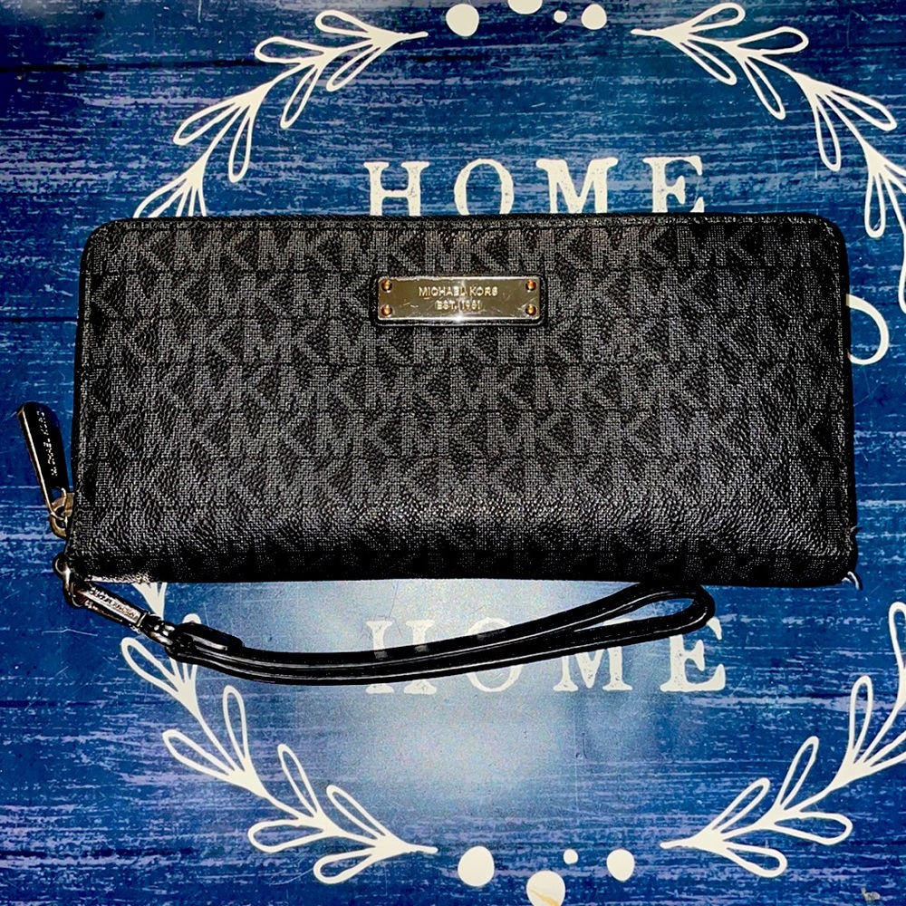 MK wallet with clutch strap